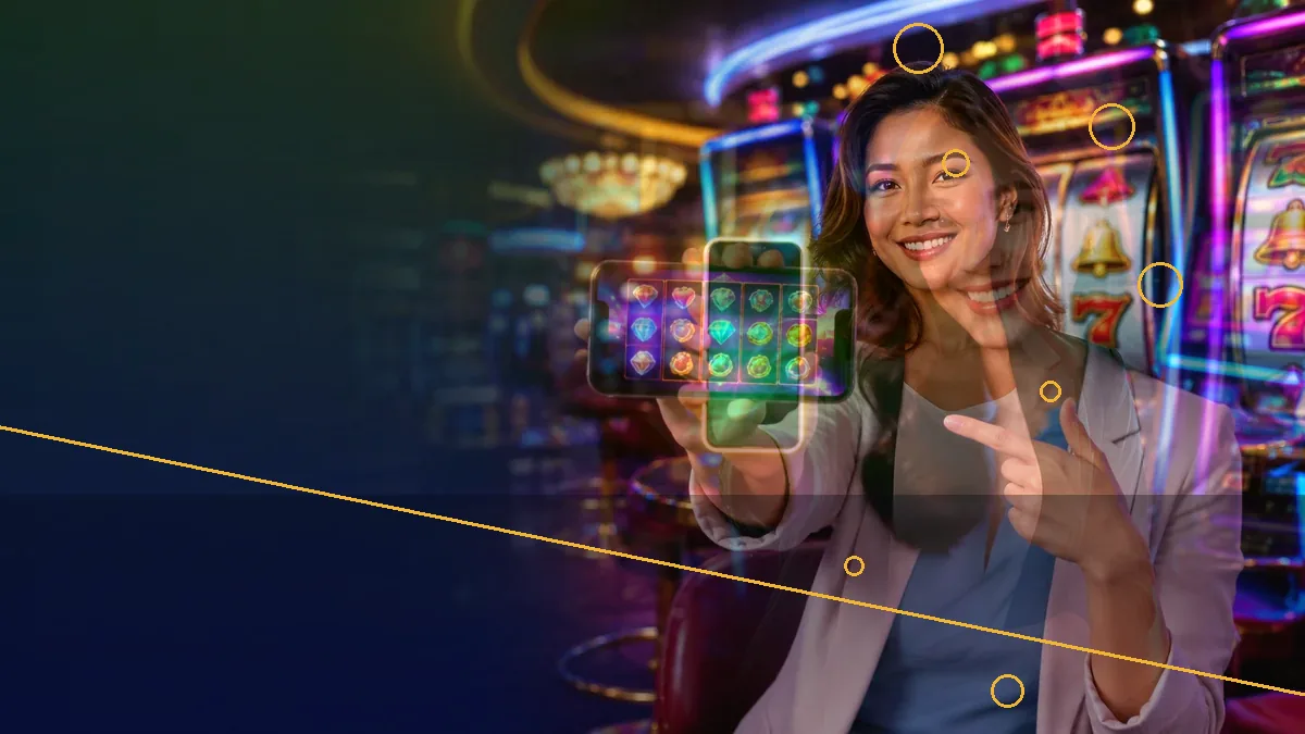 Adult woman holding a phone beside colourful machines and a dark graphic panel — L444 guide